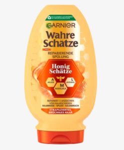 Dầu xả GARNIER Wahre Schätze Honig mật ong phục hồi tóc hư tổn, gãy rụng, 250ml