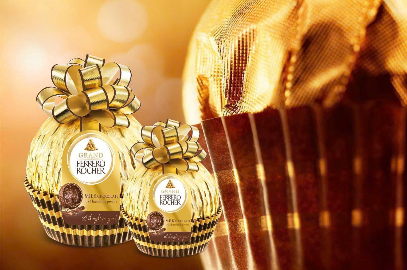 Socola Ferrero Rocher Milch Schocolade cầu nơ vàng, 125g Socola Ferrero Rocher Milch Schocolade cầu nơ vàng, 125g