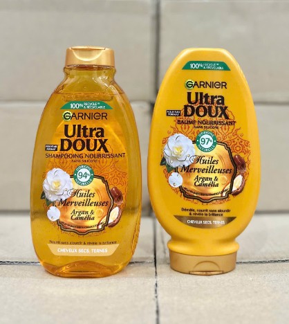 Cặp gội xả Garnier Ultra Doux Huile Merveilleux Argan & Camélia cho tóc khô, 250+200ml Cặp gội xả Garnier Ultra Doux Huile Merveilleux Argan & Camélia cho tóc khô, 250+200ml